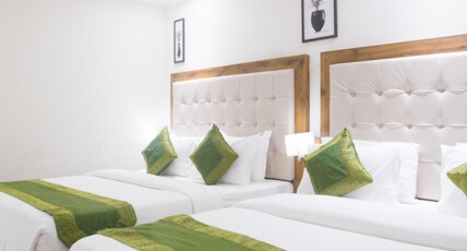 Treebo Amber International Room Type - Spacious Premium Room