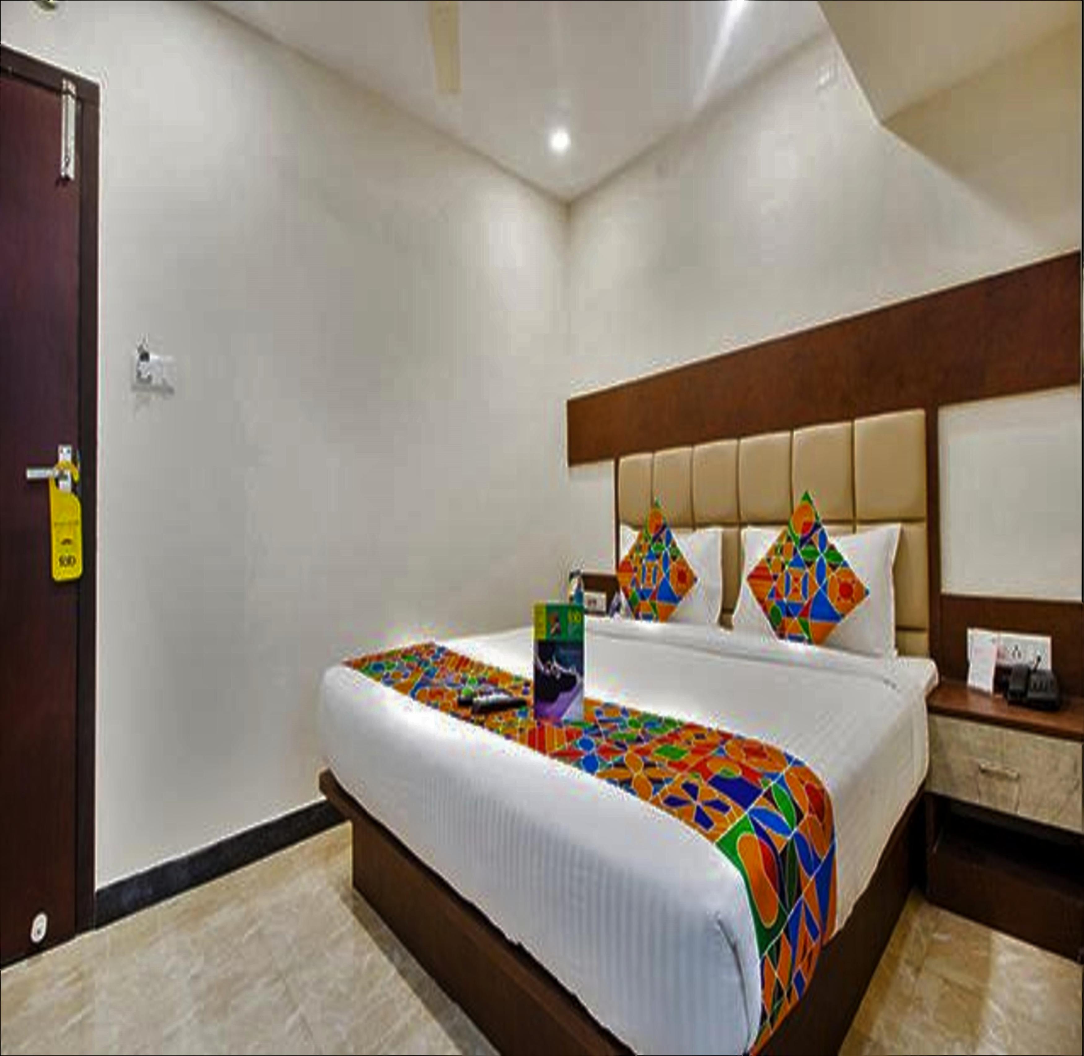 FabHotel Crown Suites - Nr. Sony Signals - Tap to explore photos