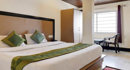 Treebo Mayur, Mall Road Room Type - Deluxe Room With Mountain View