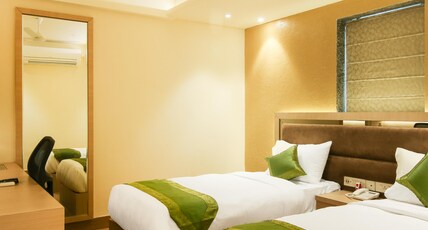 Treebo Hoops - Airport, Vip Road Room Type - Deluxe Family Room