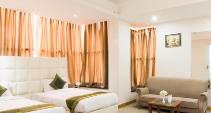 Treebo House Inn Room Type - Deluxe Room