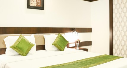 Treebo Premium Akshaya Mahal Inn - Near Mysore Palace Room Type - Deluxe Room