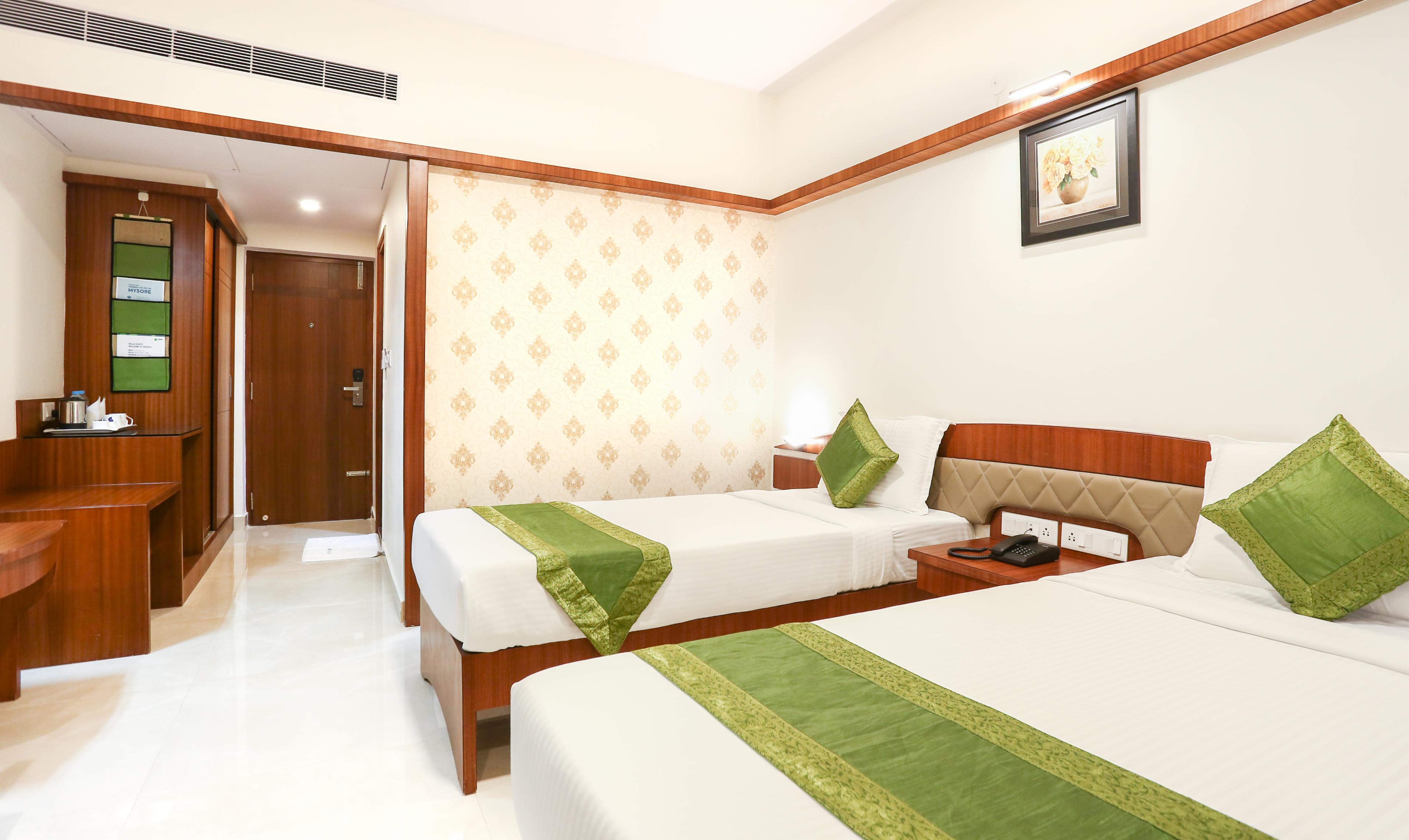 Treebo Premium Akshaya Mahal Inn - Near Mysore Palace - Tap to explore photos