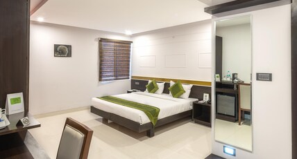 Treebo Raj Premier, Indiranagar Room Type - Standard Room