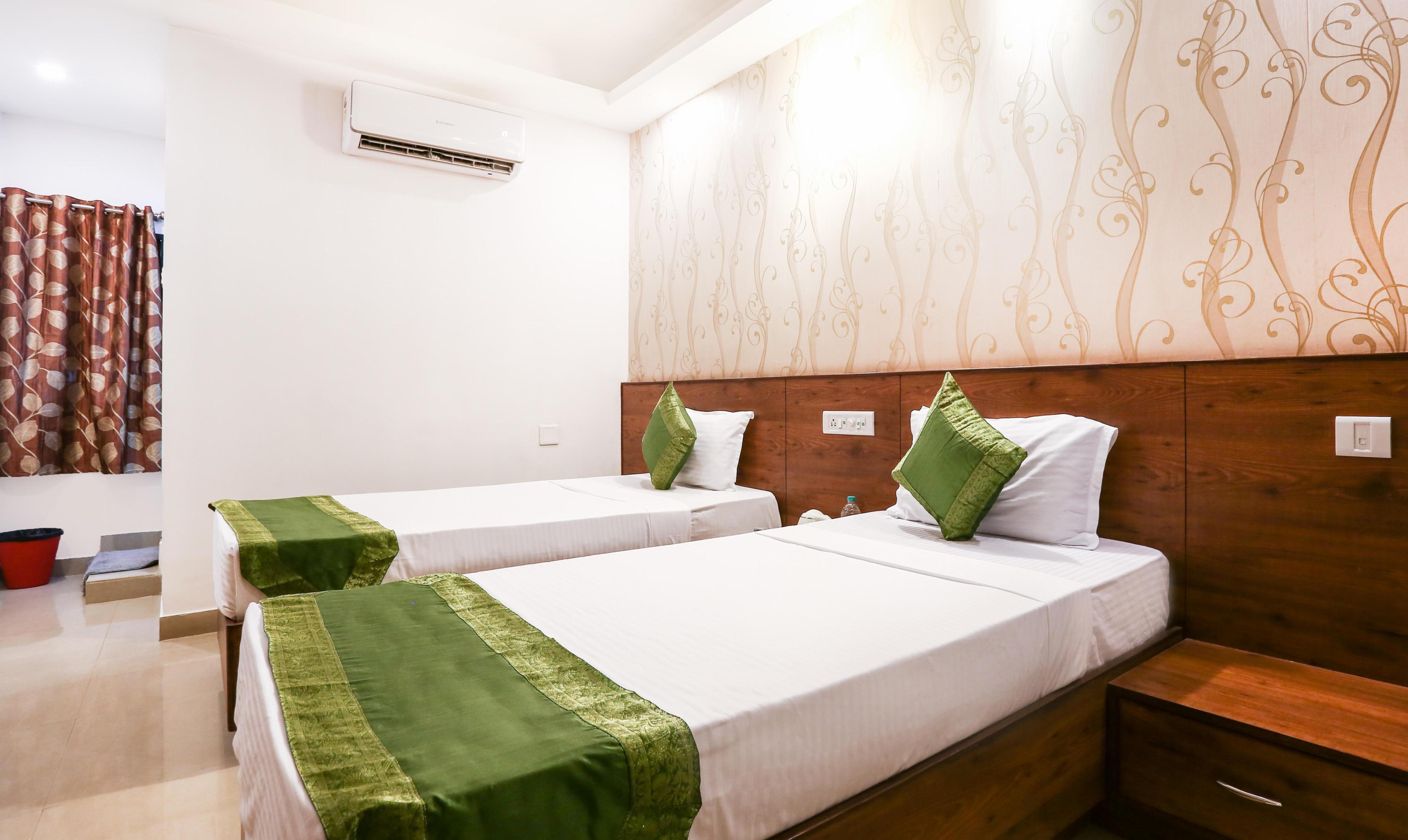 Treebo Comforts Inn, University Road Deralakatte - Tap to explore photos