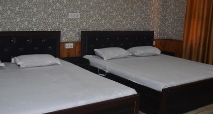 HOTEL HUMA NEAR AIRPORT Room Type - Family Room