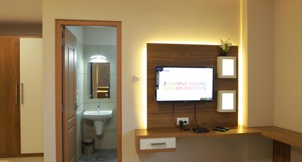 Thachoos residency Room Type - PREMIUM AC