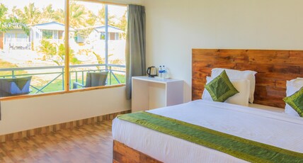 Treebo Lands End Beach Resort Morjim Room Type - Standard Room with Lawn View