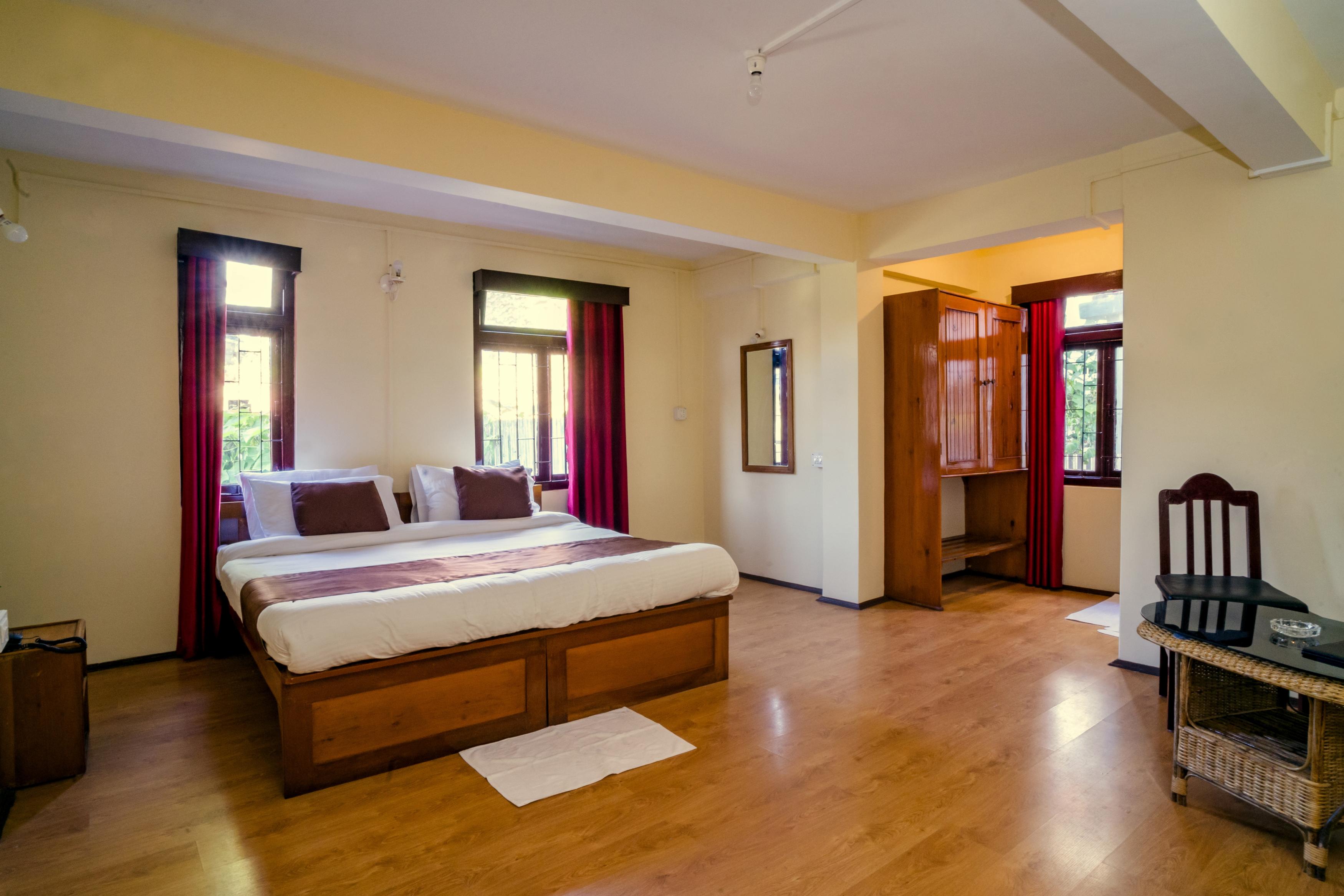 Magpie Mall Road Residency (MG Marg) - Tap to explore photos
