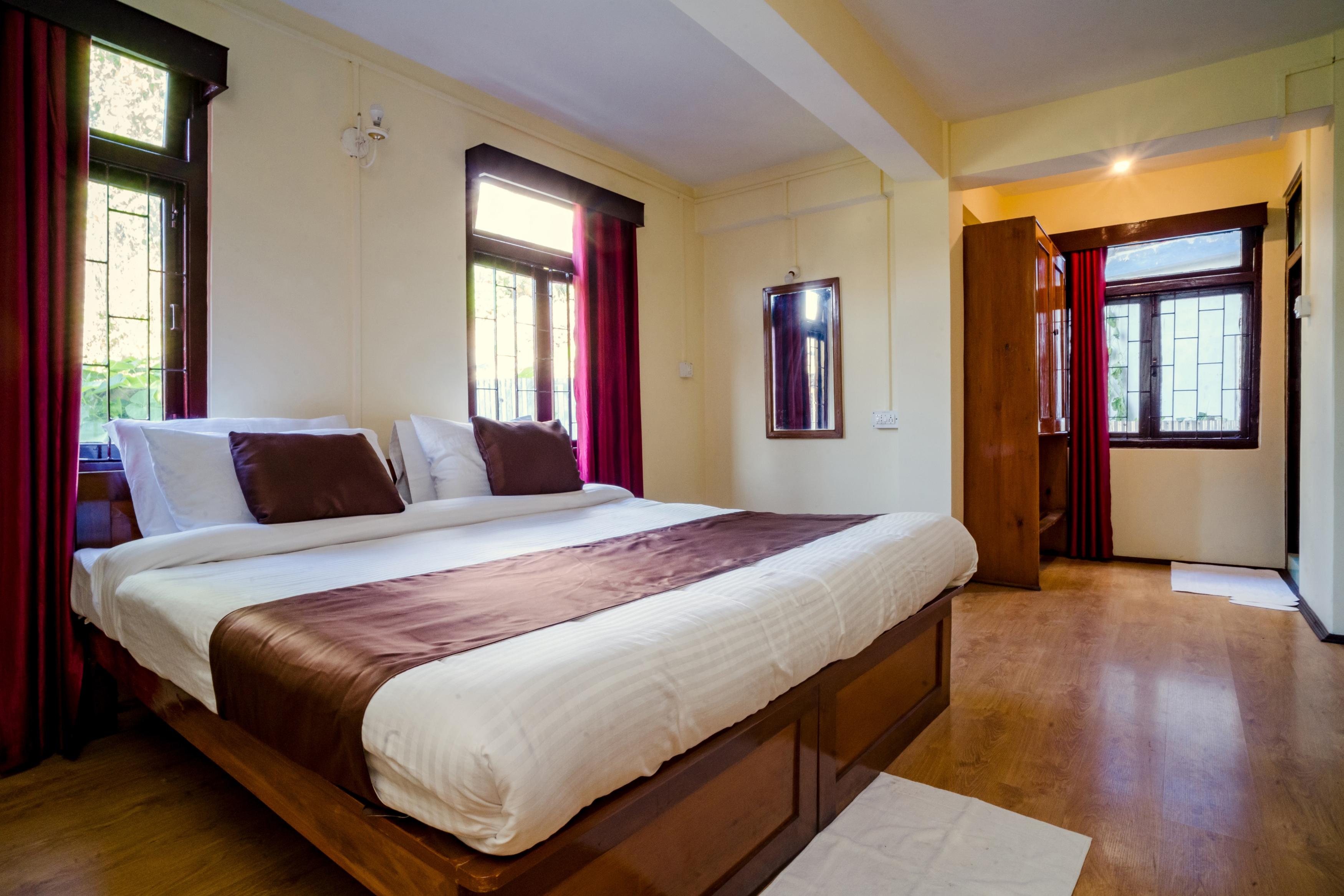 Magpie Mall Road Residency (MG Marg) - Tap to explore photos