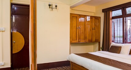 Magpie Mall Road Residency (MG Marg) Room Type - DELUXE ROOM