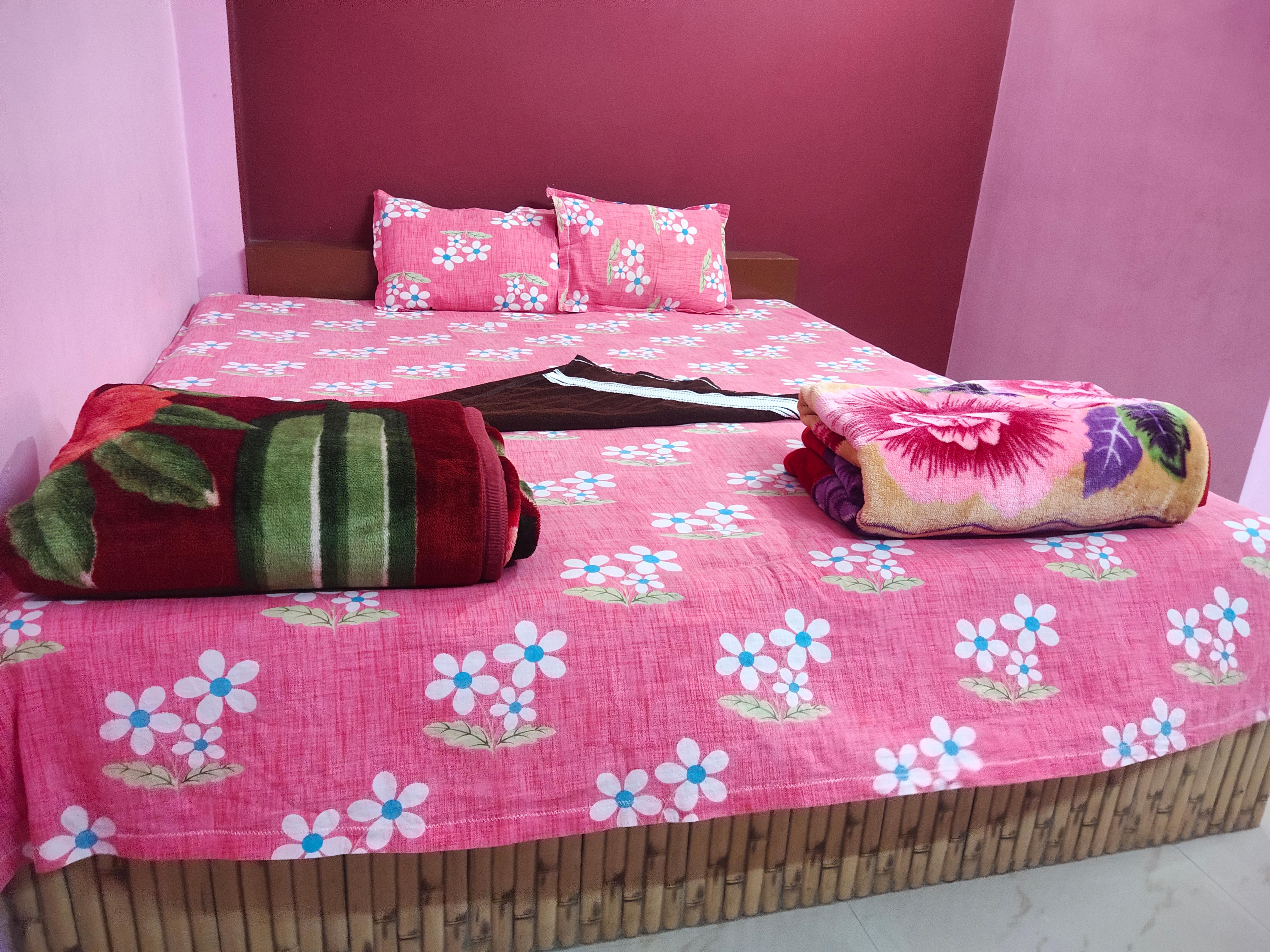 Sinjan Residency Room Type - NON AC DOUBLE BED DELUXE