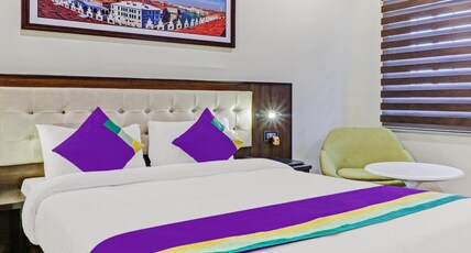 Treebo Premium Raj Vista Global Village Room Type - Deluxe Room