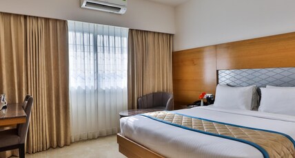 Hotel VBR Grand Inn Room Type - Deluxe Room