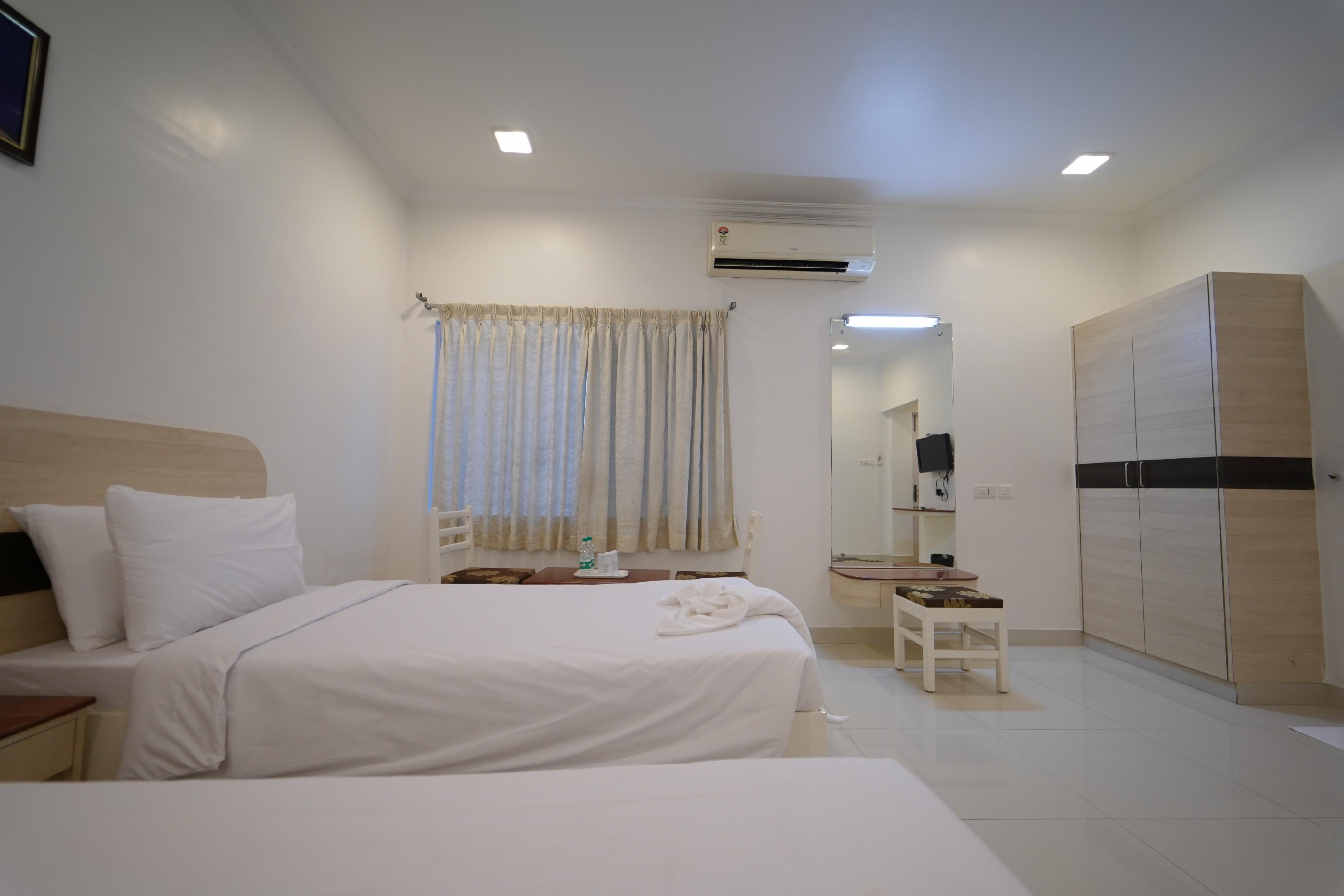 Hotel Palmyra Grand Inn, - Tap to explore photos