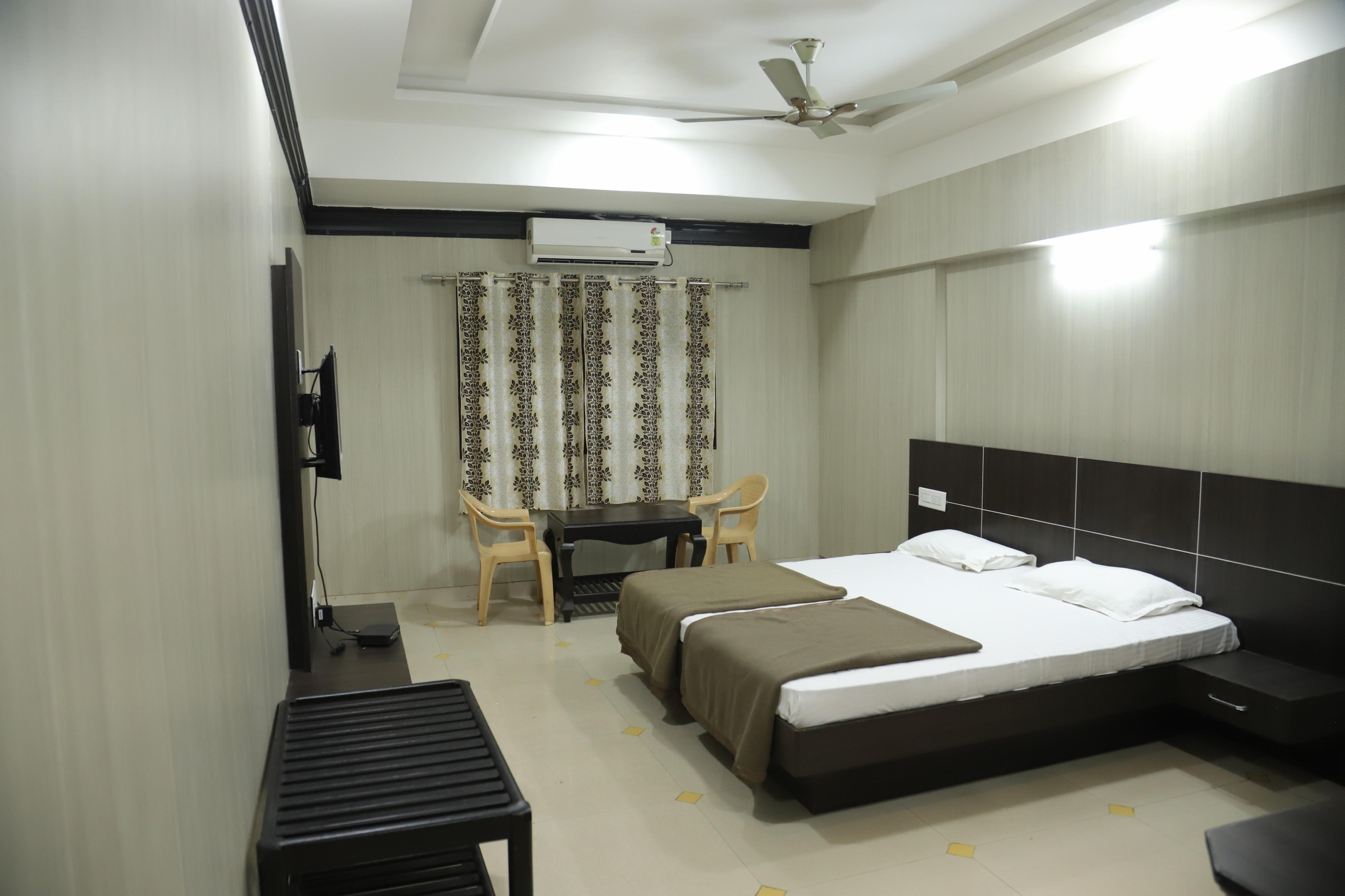 Siddeshwara Comforts Room Type - Super Deluxe AC