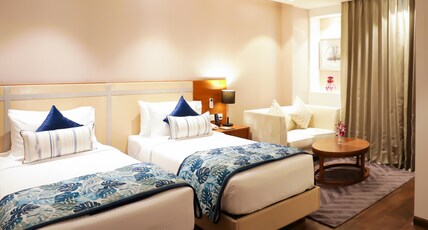 Regenta Suites Gurugram, Sector 49 Sohna Road Room Type - Executive Twin Room with Private Balcony Regenta Suites Gurugram, Sector 49 Sohna Road Room Type - Executive Twin Room with Private Balcony