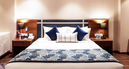 Regenta Suites Gurugram, Sector 49 Sohna Road Room Type - Executive Room with Kitchenette and Private Balcony Regenta Suites Gurugram, Sector 49 Sohna Road Room Type - Executive Room with Kitchenette and Private Balcony