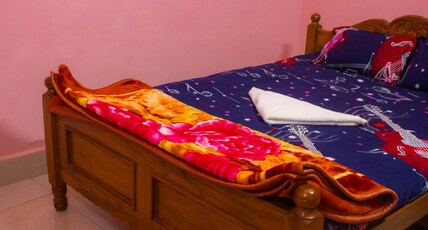 Basant Bihar managed by Universal Green Commerce Room Type - Double Bed Common Bath