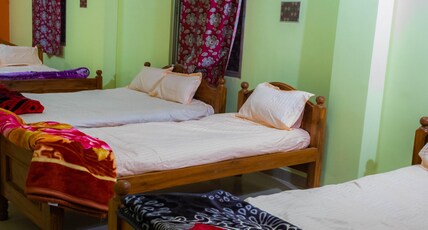 Basant Bihar managed by Universal Green Commerce Room Type - Four Bed Room with non-attached bath