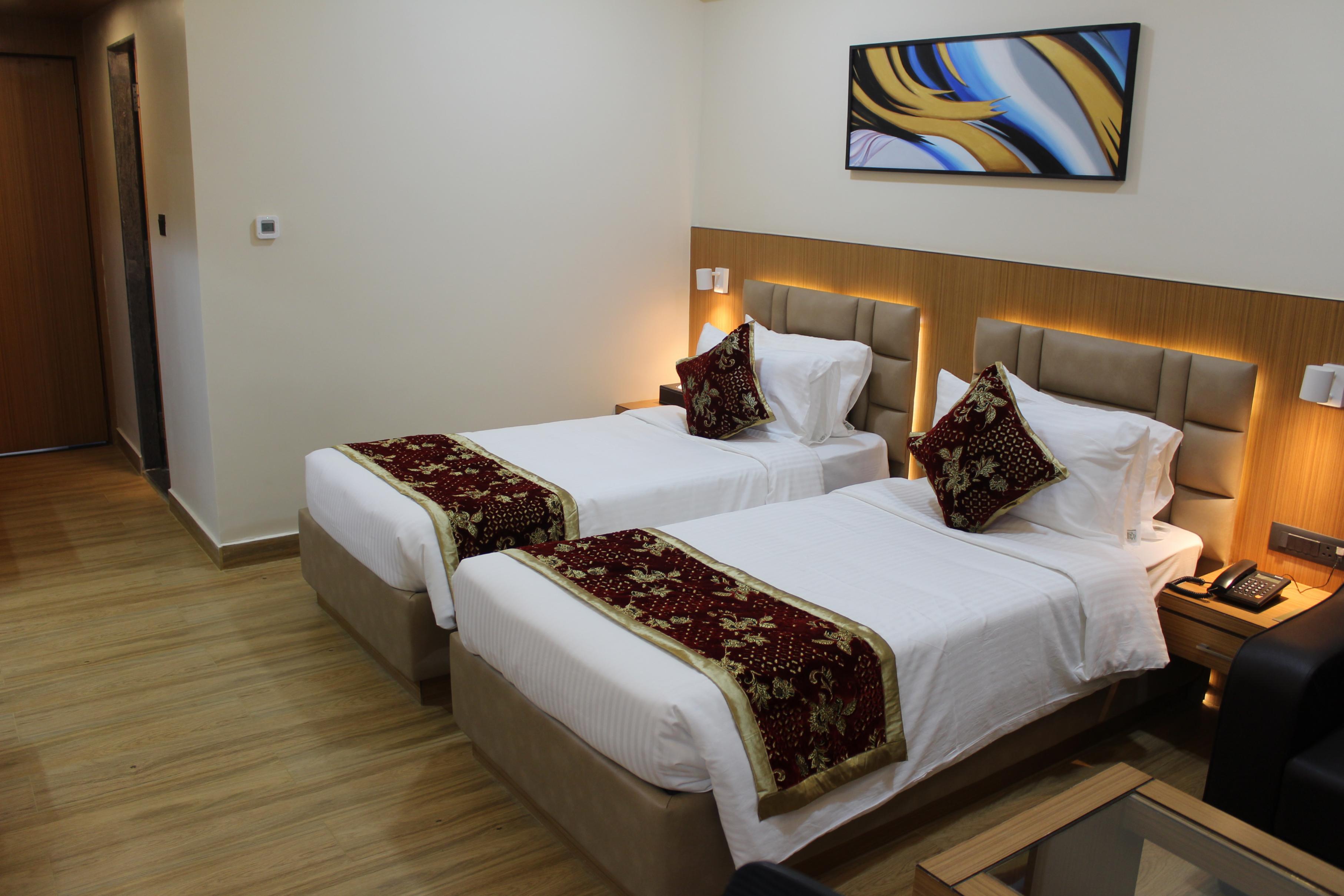 S R Continental Room Type - Premium Twin AC Room