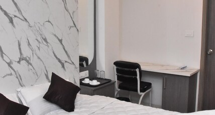 Sanns Tropicana. Room Type - Deluxe Double