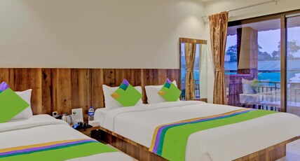 Treebo Nakshatra Cottages Mahabaleshwar Room Type - Deluxe Family Room with Garden View