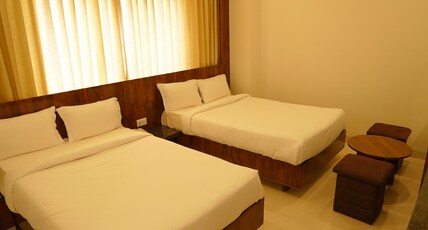 SPRINGS HOTEL Room Type - STANDARD 4 Bedded AC Family Room