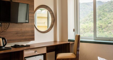 Hotel Dream Inn Tapovan with Inhouse Parking Room Type - Premium Room with Window Hotel Dream Inn Tapovan with Inhouse Parking Room Type - Premium Room with Window