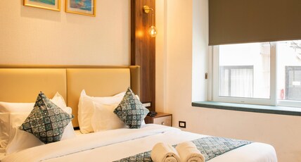 Hotel Dream Inn Tapovan with Inhouse Parking Room Type - Deluxe Room with Window Hotel Dream Inn Tapovan with Inhouse Parking Room Type - Deluxe Room with Window