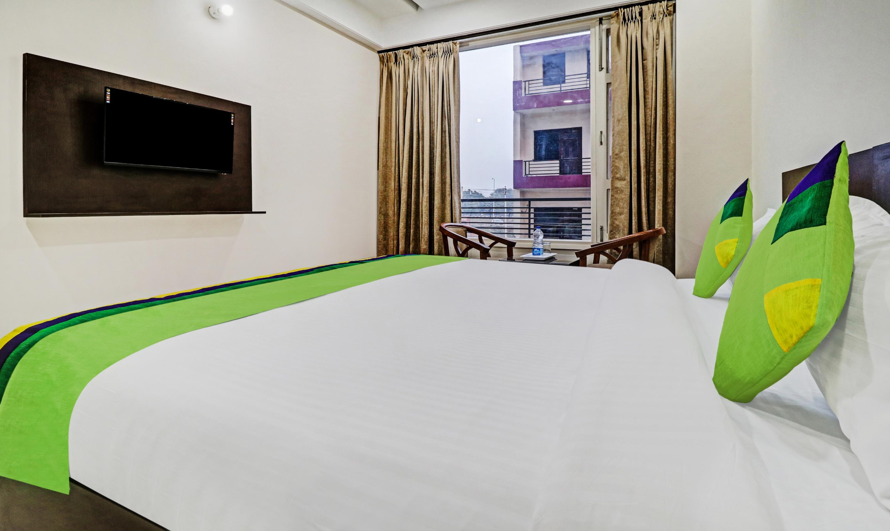 Treebo Kamron Regency Sector 80 - Tap to explore photos