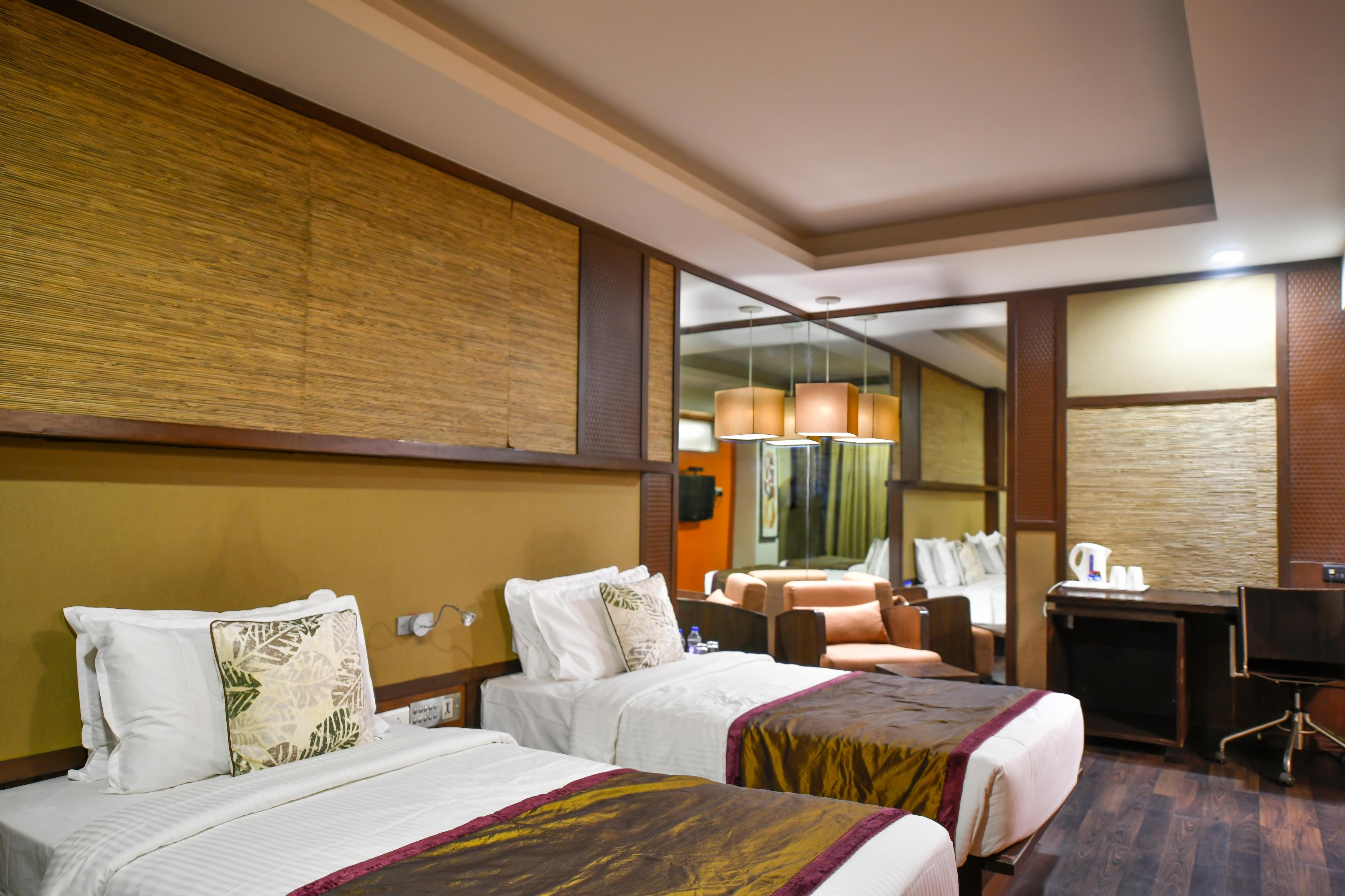 Premier Tamanna Hotel - Tap to explore photos