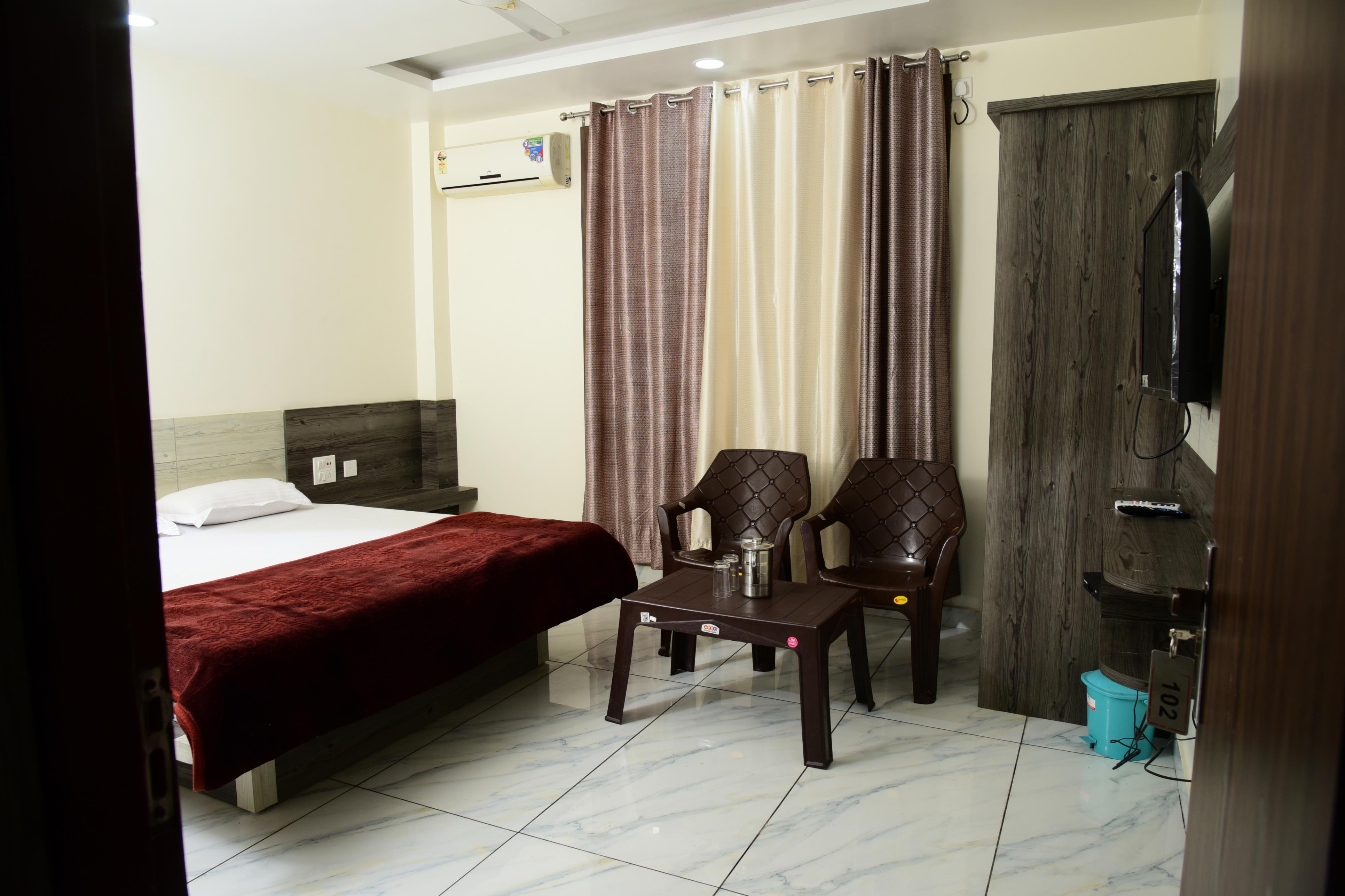 Sharma Guest House Room Type - Deluxe Room