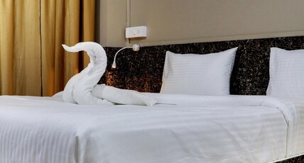 Wing's The Pride | Rooms & Restaurant Room Type - Premium Room