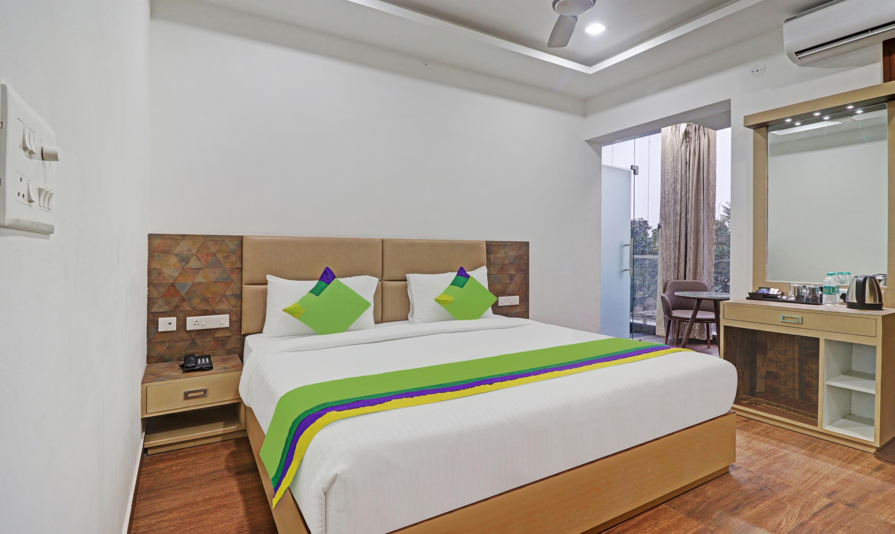 Treebo Kanopy Greens Near Railway Station Room Type - Deluxe Room with Balcony
