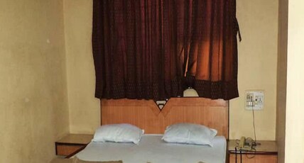 Hotel SaiKiran Surat Room Type - Deluxe Room