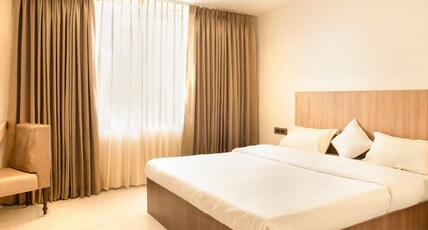 Kuber Suites Room Type - Deluxe Room -King Bed.