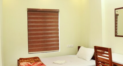 MIST RESIDENCY Room Type - Single Room