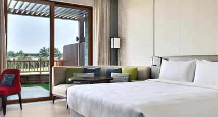 JW Marriott Bengaluru Prestige Golfshire Resort and Spa Room Type - Garden Terrace, Guest room, 1 King, Garden view, Balcony JW Marriott Bengaluru Prestige Golfshire Resort and Spa Room Type - Garden Terrace, Guest room, 1 King, Garden view, Balcony