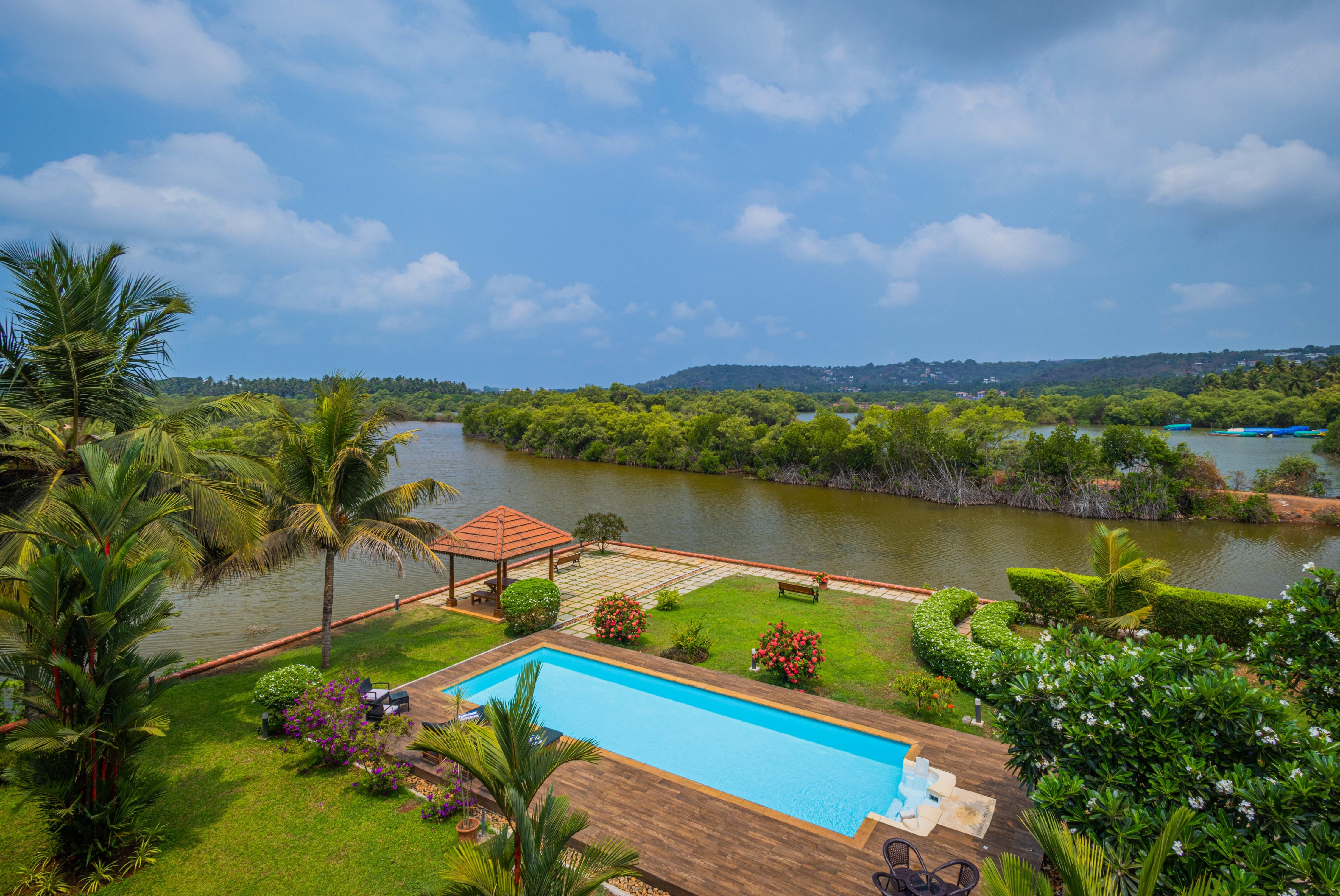 Rainforest Aquamarinne 4 BHK RiverFront Private Pool Villa - Tap to explore photos