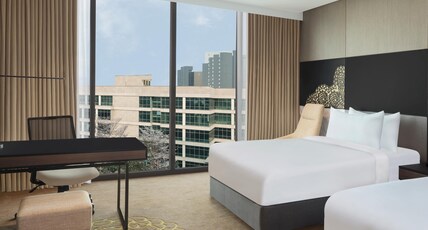 Hilton Bengaluru Embassy Manyata Business Park Room Type - King Executive Room with 1 Way Airport Transfer, 2Pcs Laundry, Lounge Access