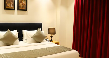 Hotel Malbork Inn @ Rajouri Garden, Delhi Room Type - Deluxe AC Room with Smart TV Hotel Malbork Inn @ Rajouri Garden, Delhi Room Type - Deluxe AC Room with Smart TV