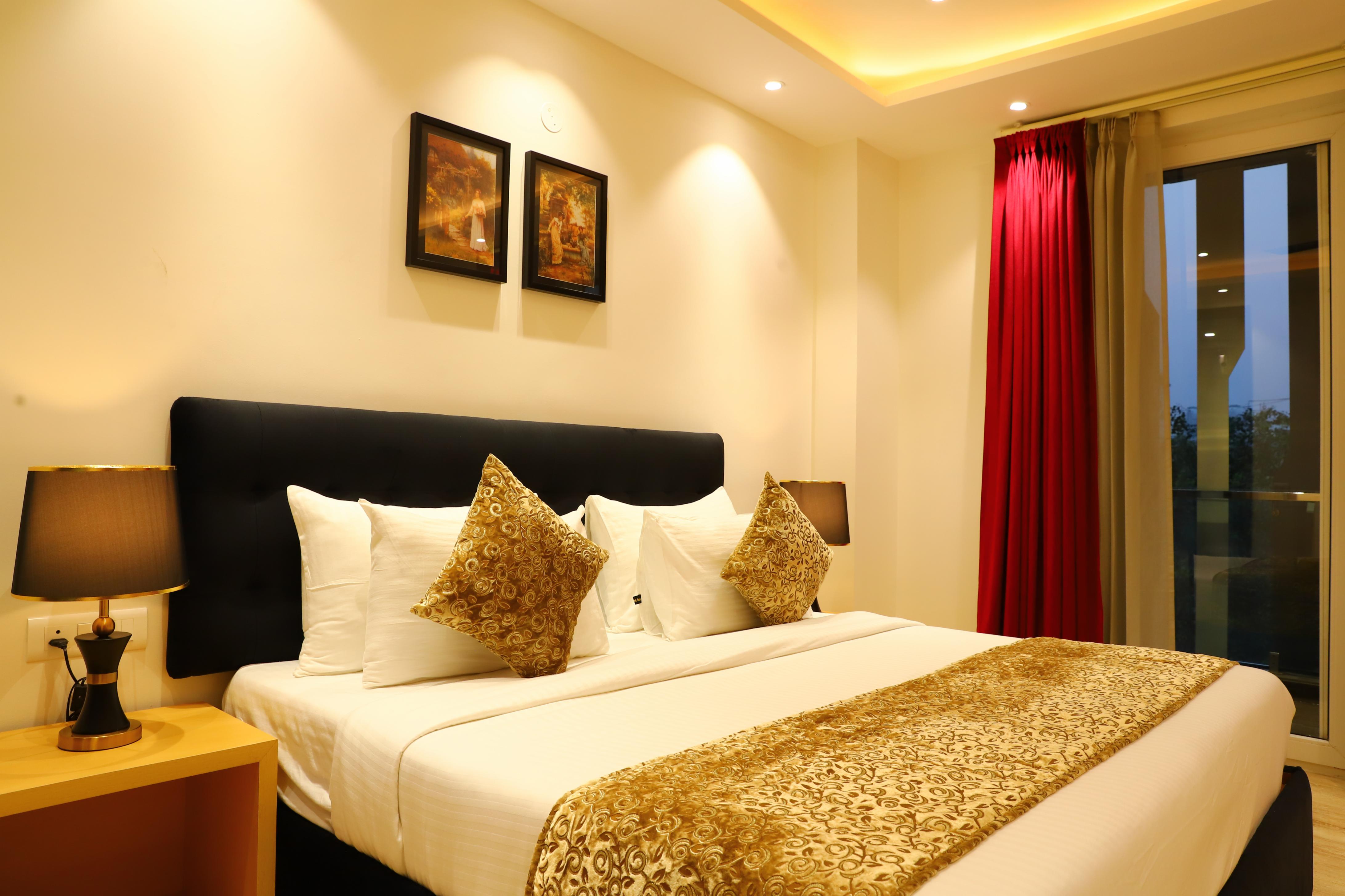 Hotel Malbork Inn @ Rajouri Garden, Delhi - Tap to explore photos