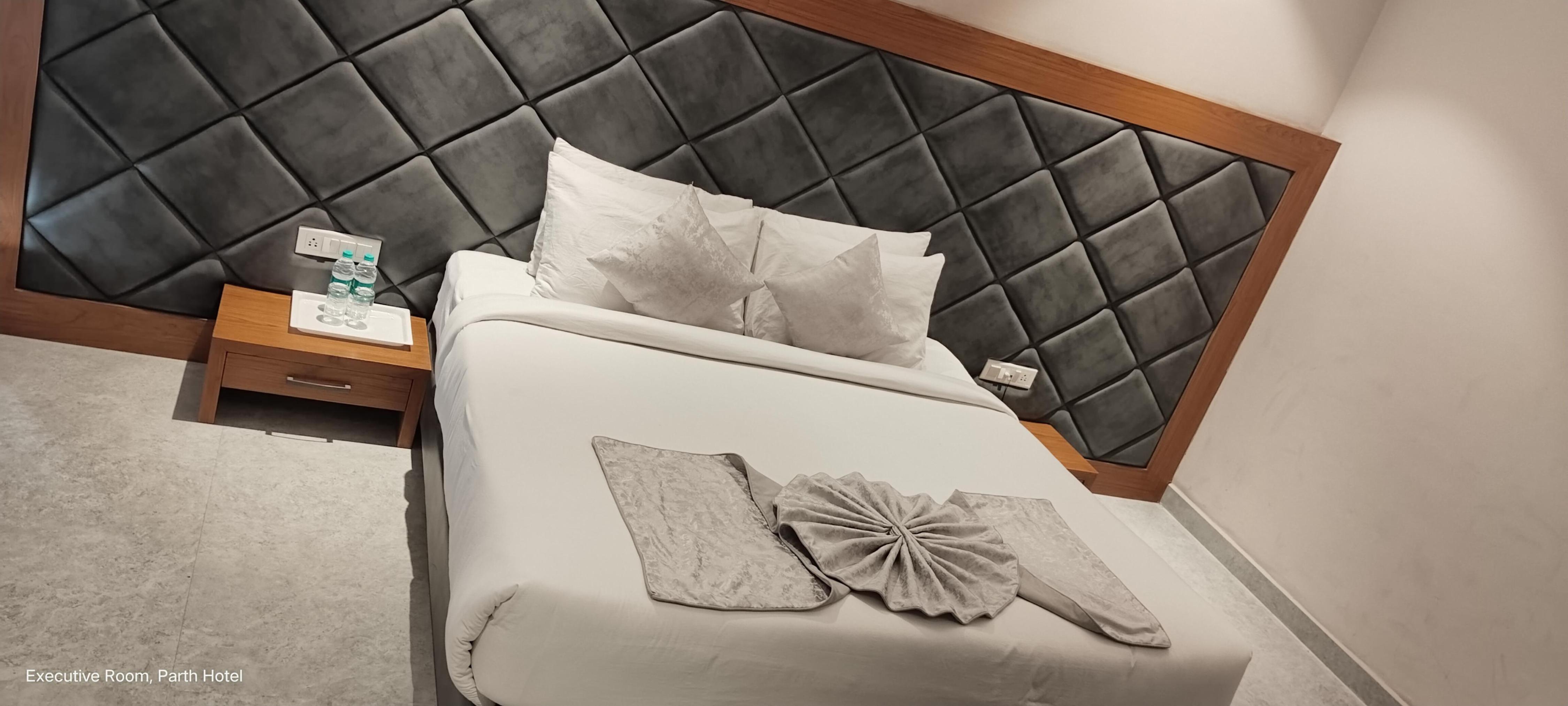 Hotel Parth - Tap to explore photos