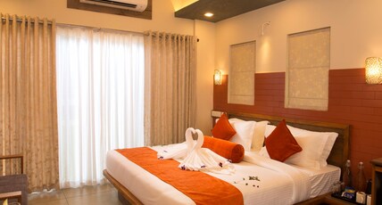 Amrezy Resort & Spa Room Type - Serene Cottage Air Conditioned Room With Balcony