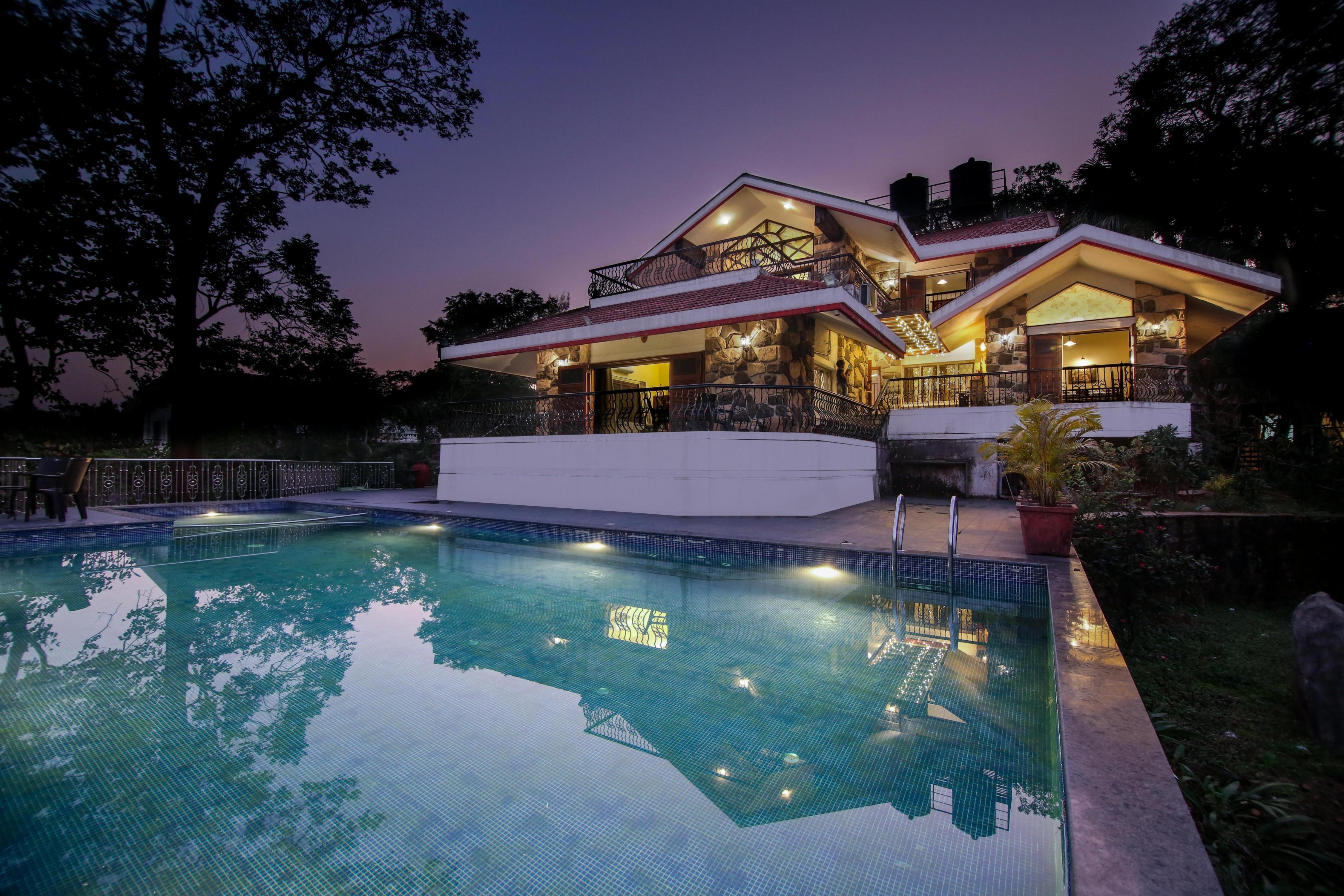 Stone by TranqVillas 4BHK Infinity Pool Retreat at Lonavala - Tap to explore photos