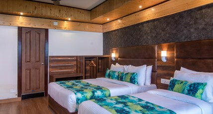 Sumitel Queens Yard Room Type - Premium Triple Room.