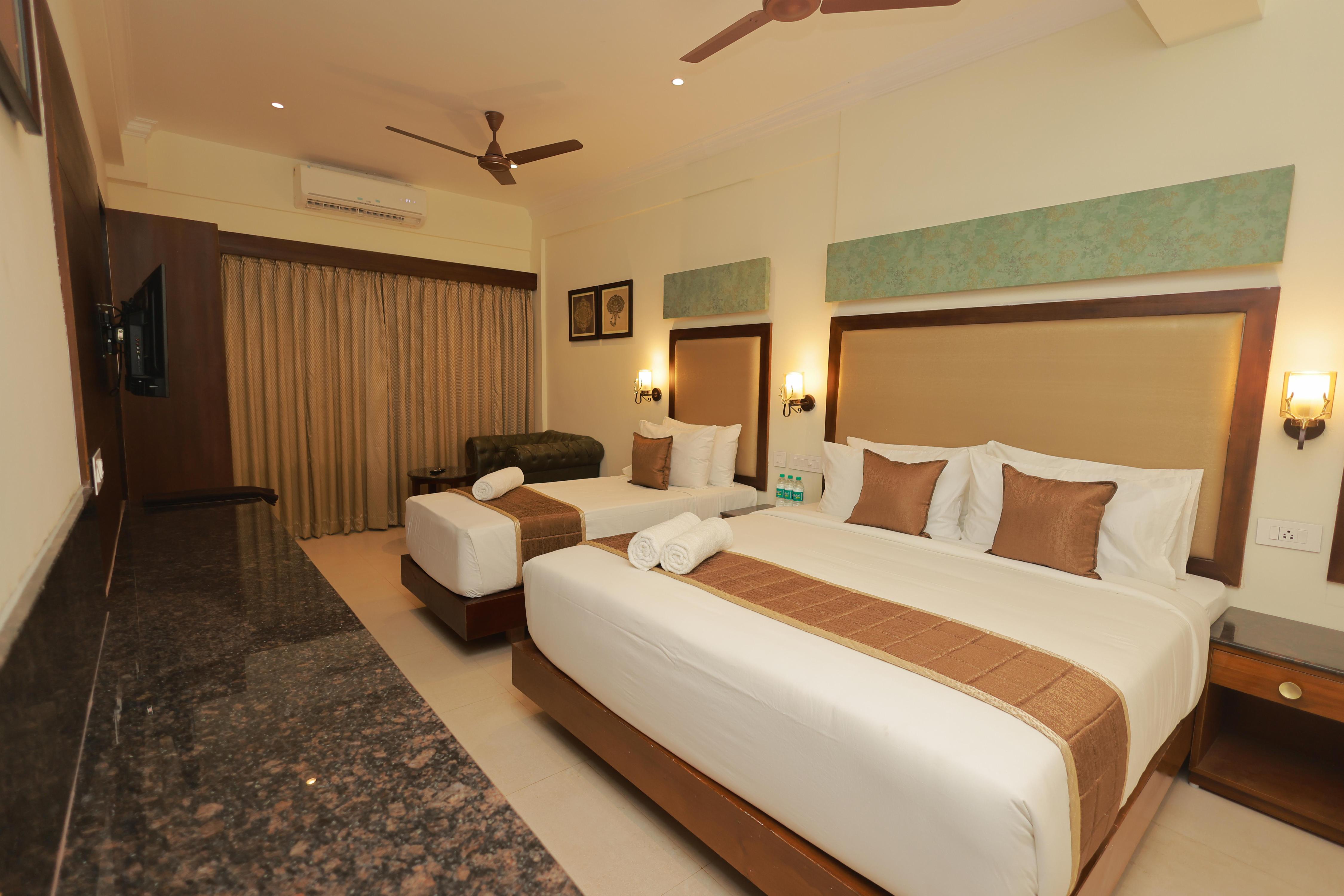 Hotel Comorin Grand - Tap to explore photos