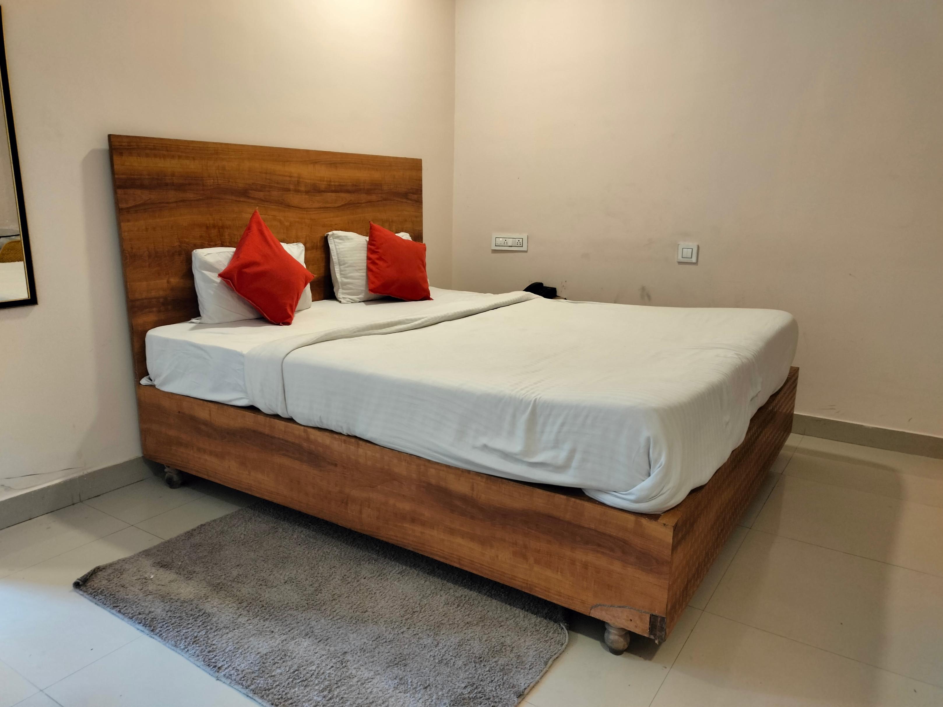 Poddar inn Room Type - Deluxe Non AC room