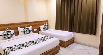 Maruti Group of Hotels - Shri Naman Room Type - Deluxe Triple Room Maruti Group of Hotels - Shri Naman Room Type - Deluxe Triple Room